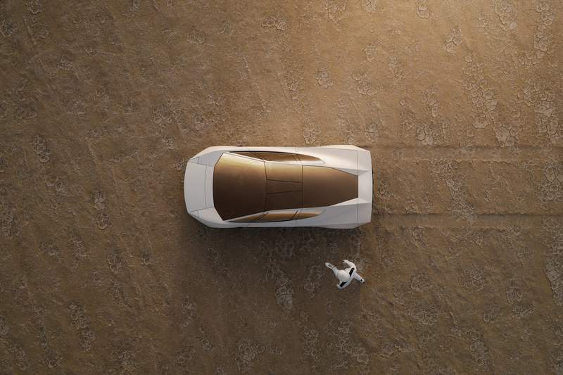 Tesla Roadster alb văzut de sus, pe un teren deșertic