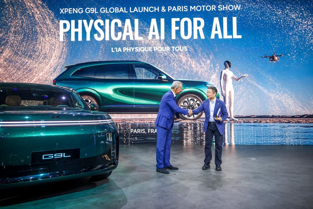 Green XPENG G9L on stage at its global launch at the Paris Motor Show