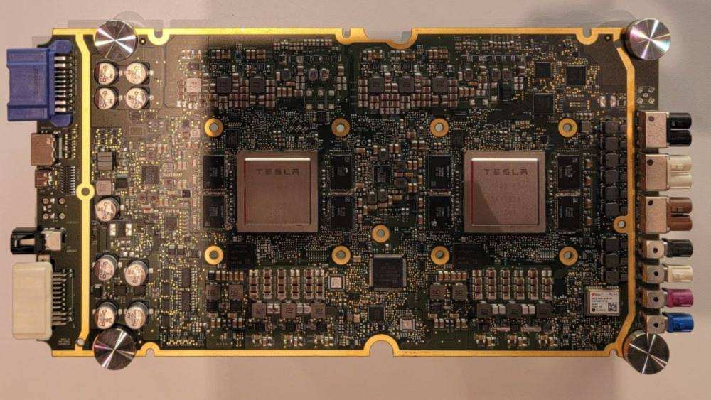 Tesla Full Self-Driving computer board with two Tesla-branded chips