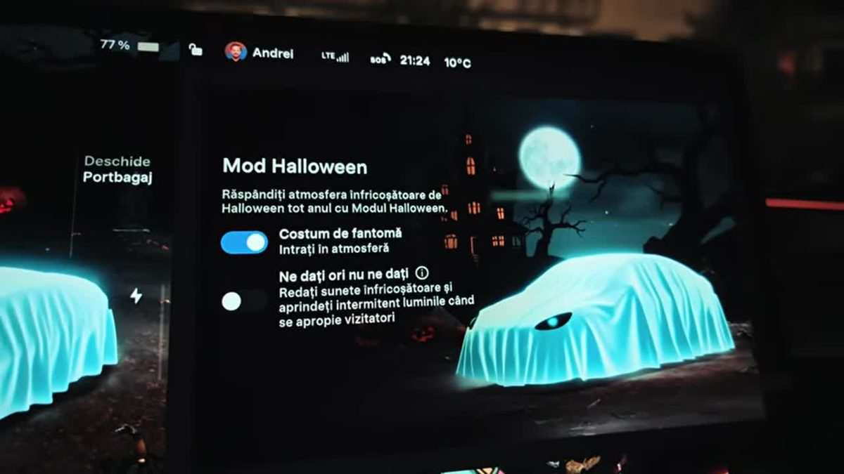Tesla screen with the Halloween Mode menu and the car wearing a ghost costume