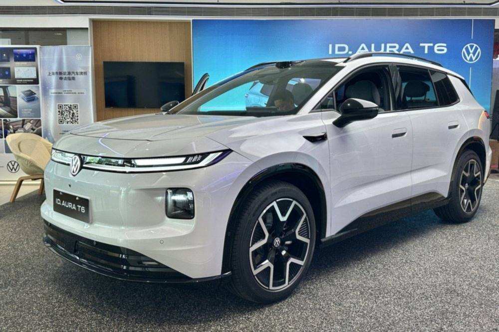 White Volkswagen ID. Aura T6 displayed in a showroom in China