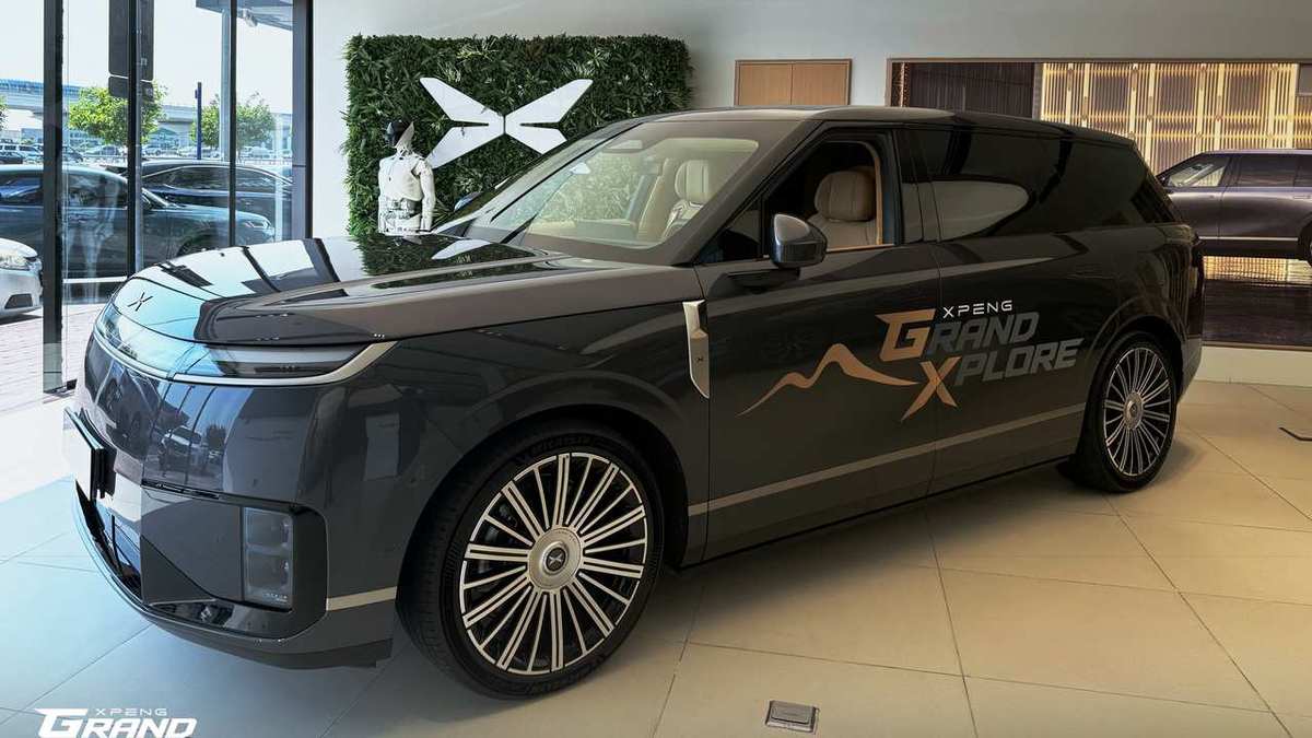 Dark grey XPENG GX on display in an XPENG showroom in the Middle East